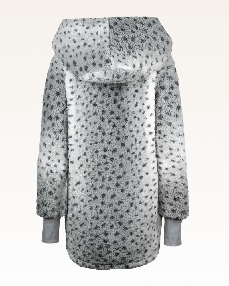 Sherpa gray and white hooded jacket on a light beige background