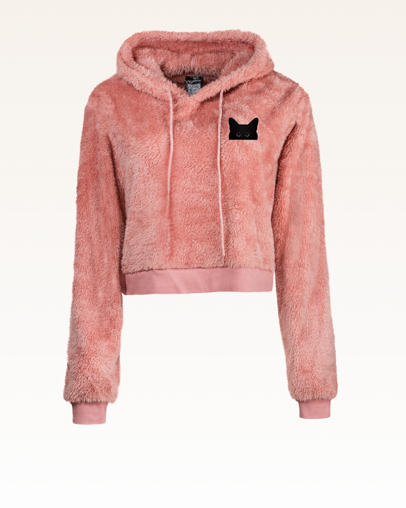 Pink fleece hoodie with a black cat patch on a white background