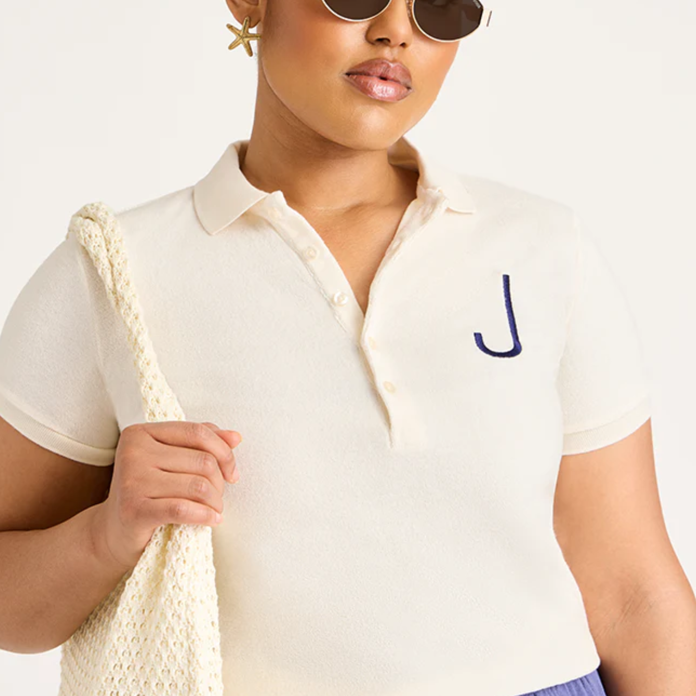 monogram terry polo with J in blue on white polo on a girl