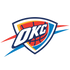 OKC Thunder logo featuring blue, orange, and yellow shield design with a basketball and the letters OKC in white across the front, with blue and orange streaks extending from the sides.