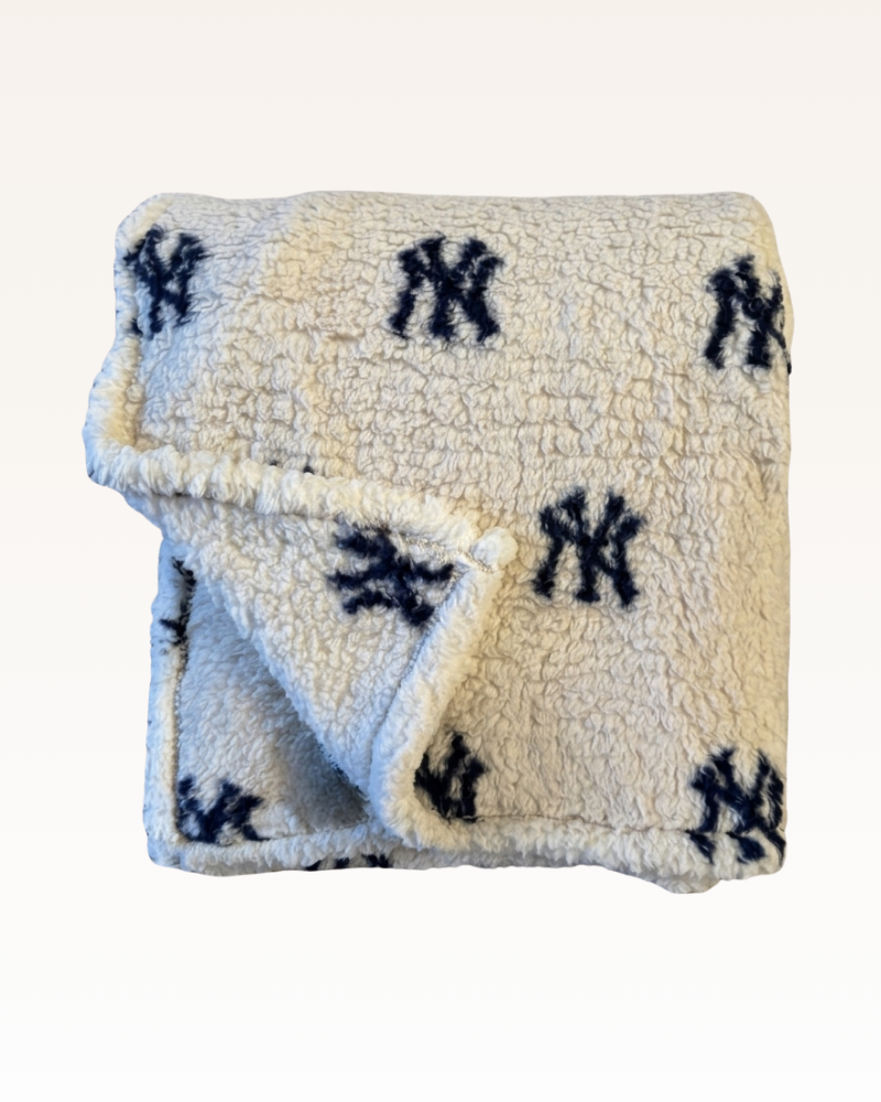 Blanket with New York Yankees logo on a white background