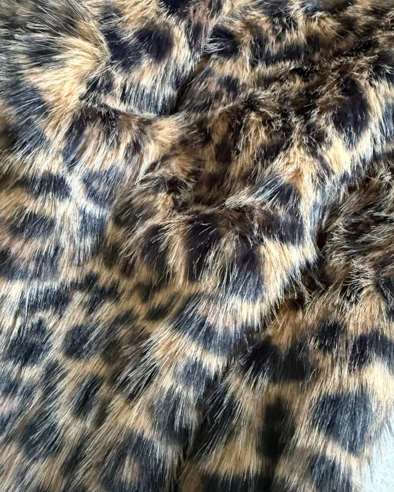 Close-up of leopard print faux fur fabric