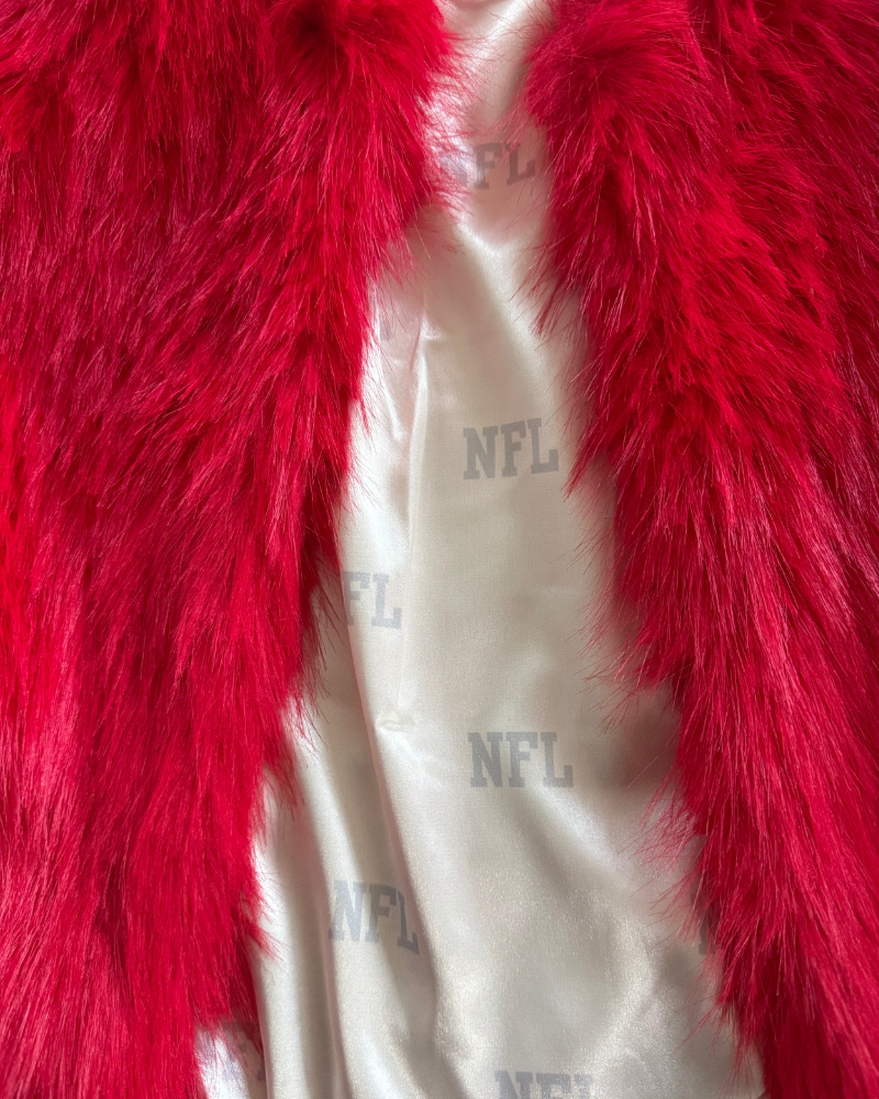 Red fur jacket over a white liningwith NFL logo