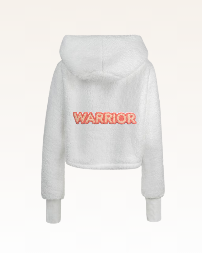 white sherpa with 'WARRIOR' text on the back against a white background