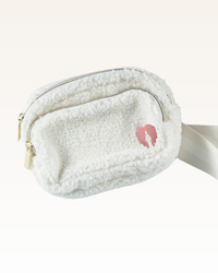 White fleece waist bag with a pink angel wings logo on a white background