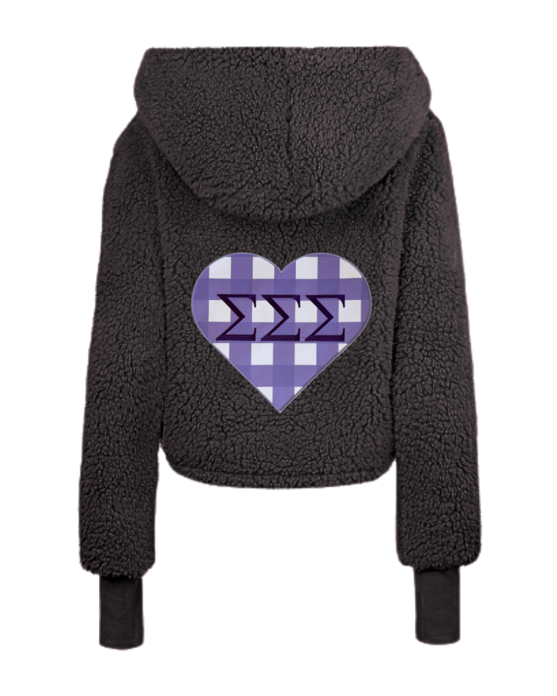 A black sherpa fleece cropped hoodie shown from the back, featuring a purple and white gingham heart graphic with three Sigma Sigma Sigma symbols in the center.