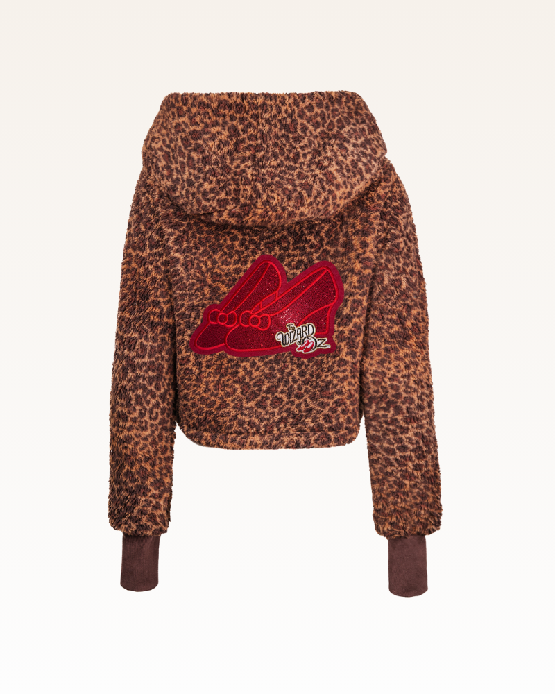 Leopard print jacket with a red patch on a white background