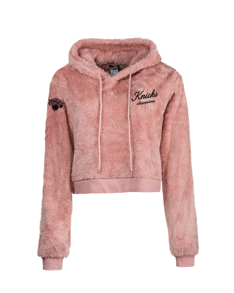 Pink sherpa hoodie with 'Knicks' branding on a white background