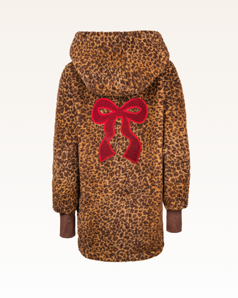 Leopard print coat with a red bow on the back against a white background