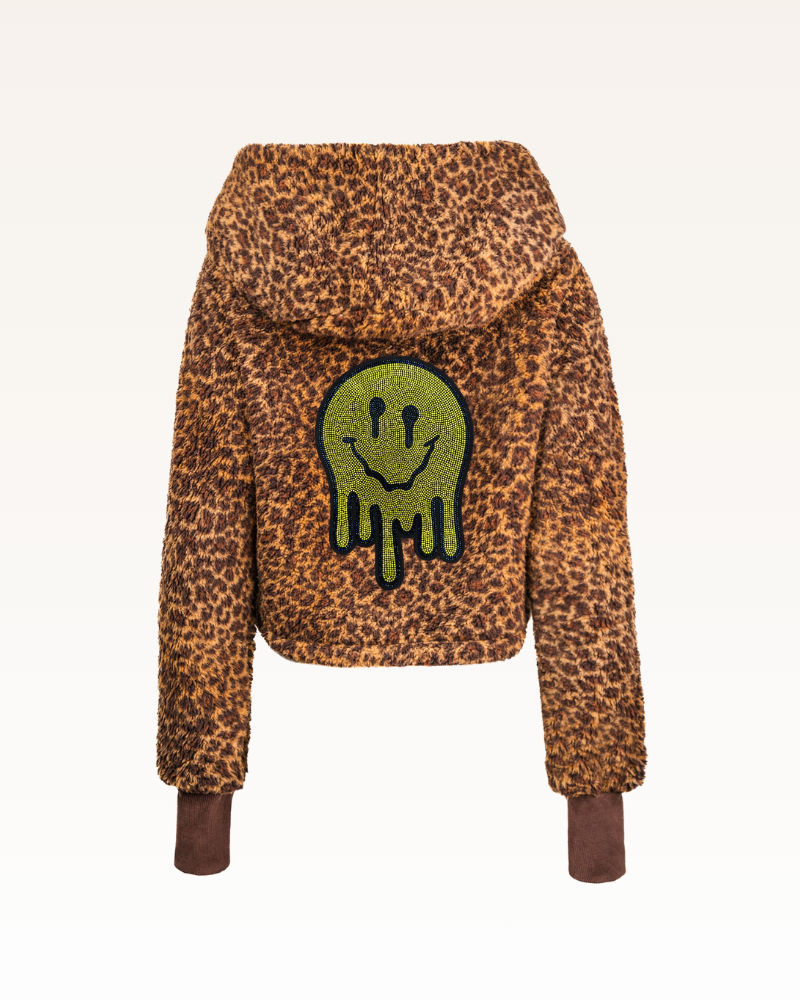 Leopard print hoodie with a green smiley face design on the back against a white background