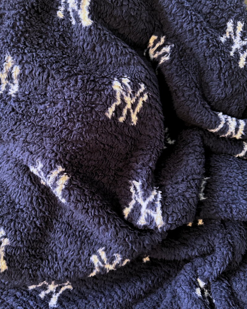 New York Yankees All Over Print 60" x 70" Sherpa Throw Blanket - Blue