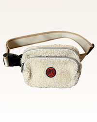 Shearling fanny pack with a logo on a white background