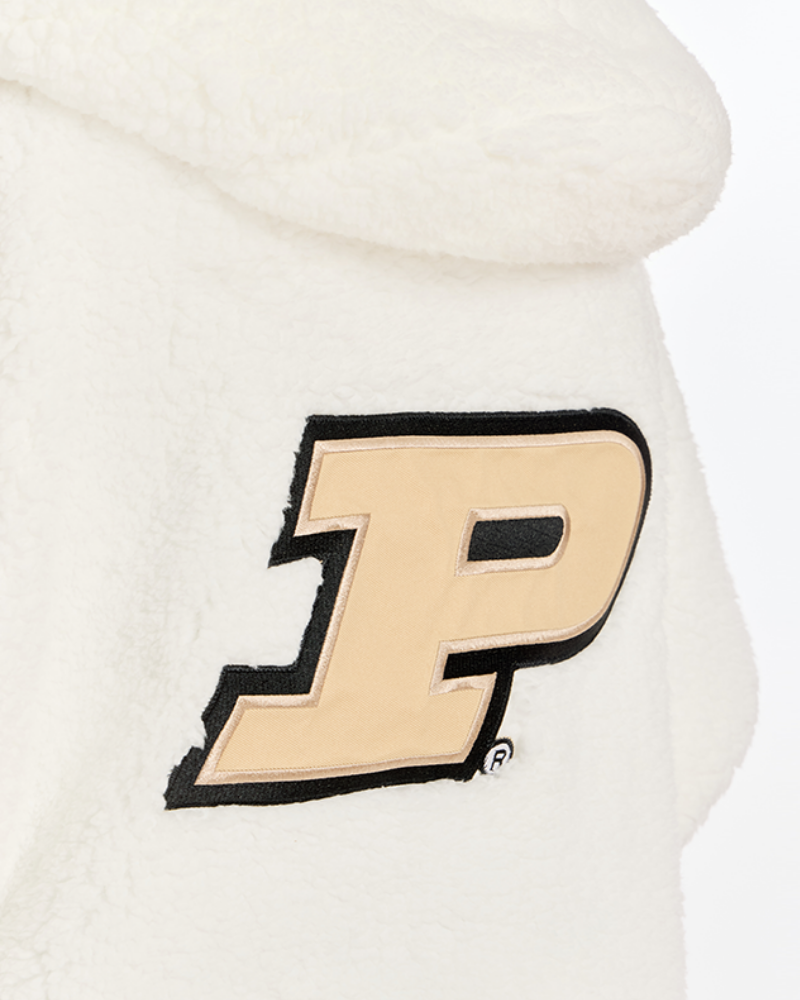Close-up of a white sherpa fleece hooded sweatshirt featuring a large embroidered Purdue 'P' logo patch on the chest.