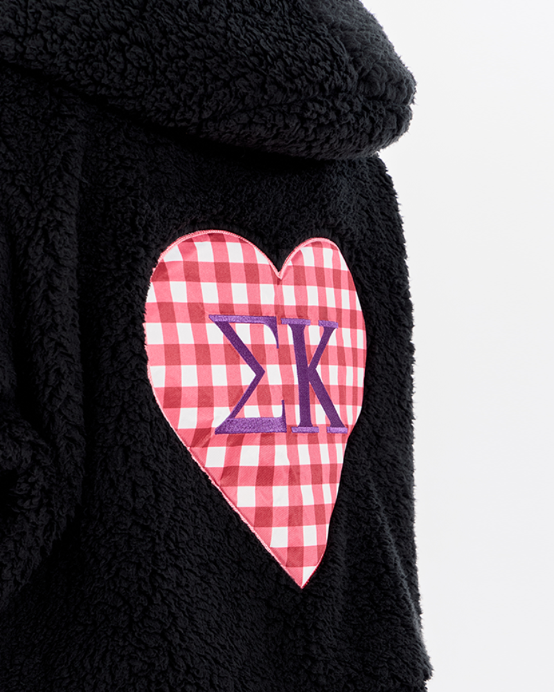 Sigma Kappa Greek Letters on the back of a black lounger