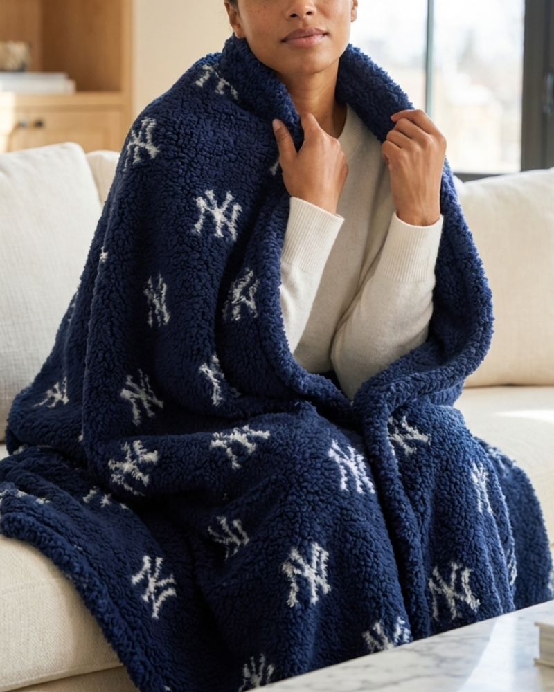 New York Yankees All Over Print 60" x 70" Sherpa Throw Blanket - Blue