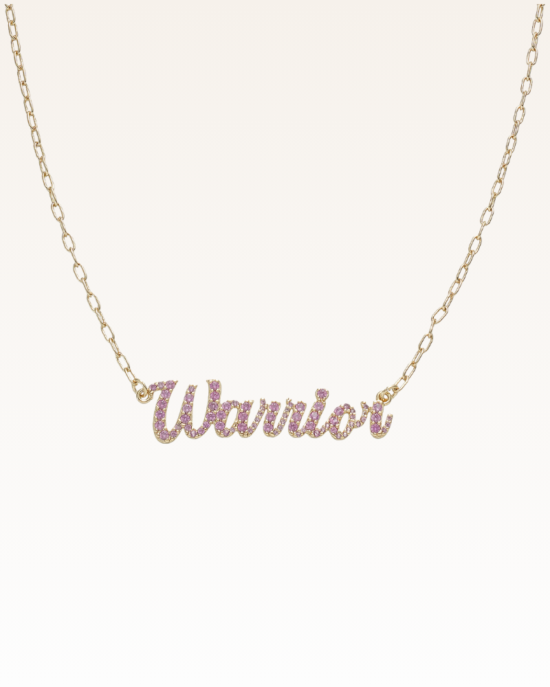 necklace with 'warrior' written in script with pink rhinestones